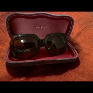 Black Gucci glasses